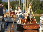 Yachts mooring at Horsey near the wind pump