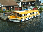 Motor cruiser on the waterfront pubs