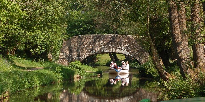 Cruising under a stone bridge